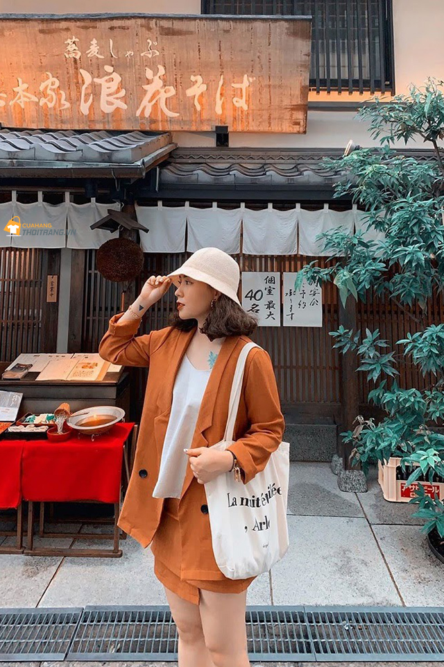 Set đồ áo blazer chân váy ôm tông cam đất nổi bật